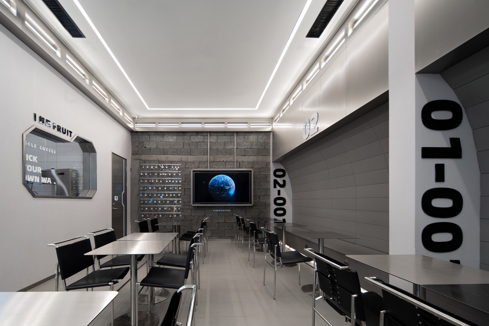 stainless steel and concrete intertwined ticle coffee series by daga architecture