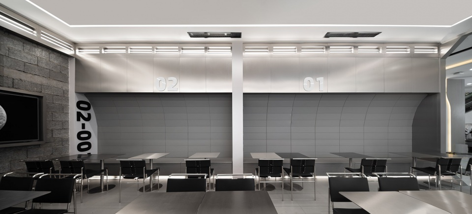 stainless steel and concrete intertwined ticle coffee series by daga architecture
