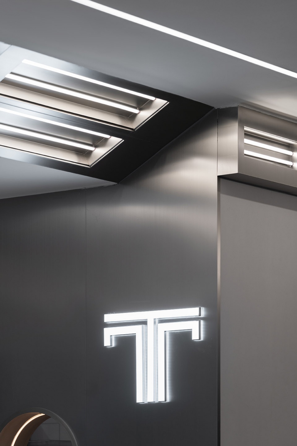 stainless steel and concrete intertwined ticle coffee series by daga architecture