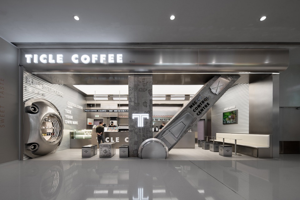 stainless steel and concrete intertwined ticle coffee series by daga architecture