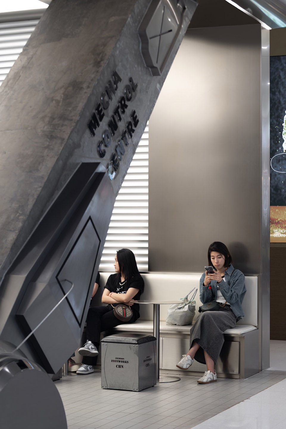 stainless steel and concrete intertwined ticle coffee series by daga architecture