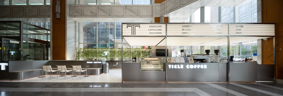 stainless steel and concrete intertwined ticle coffee series by daga architecture