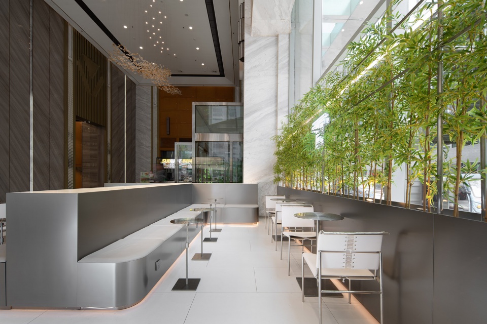 stainless steel and concrete intertwined ticle coffee series by daga architecture