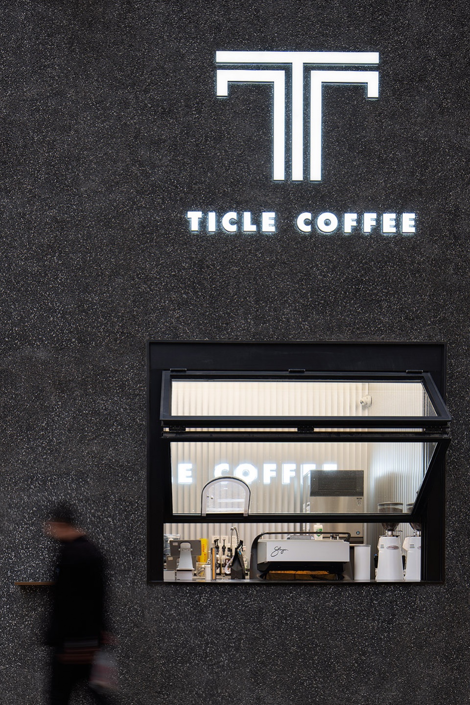 stainless steel and concrete intertwined ticle coffee series by daga architecture