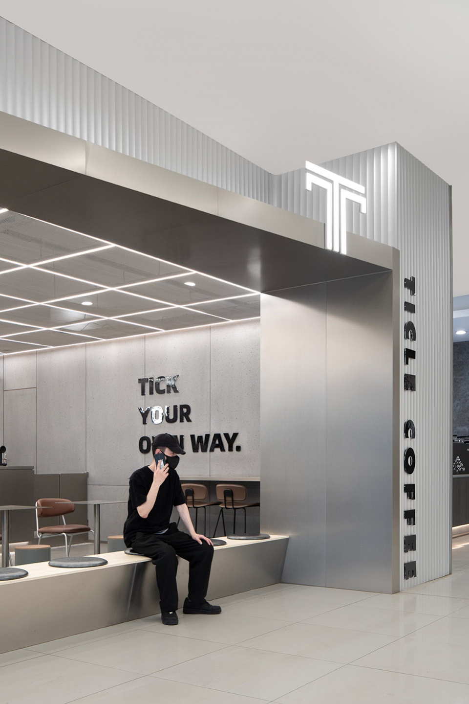 stainless steel and concrete intertwined ticle coffee series by daga architecture
