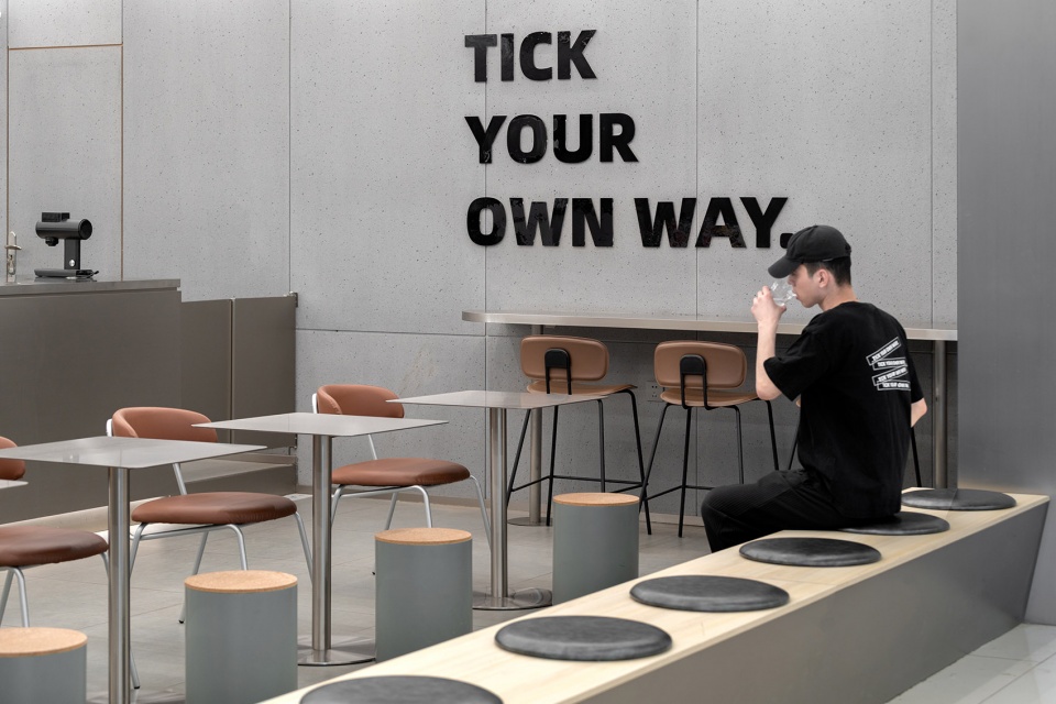 stainless steel and concrete intertwined ticle coffee series by daga architecture
