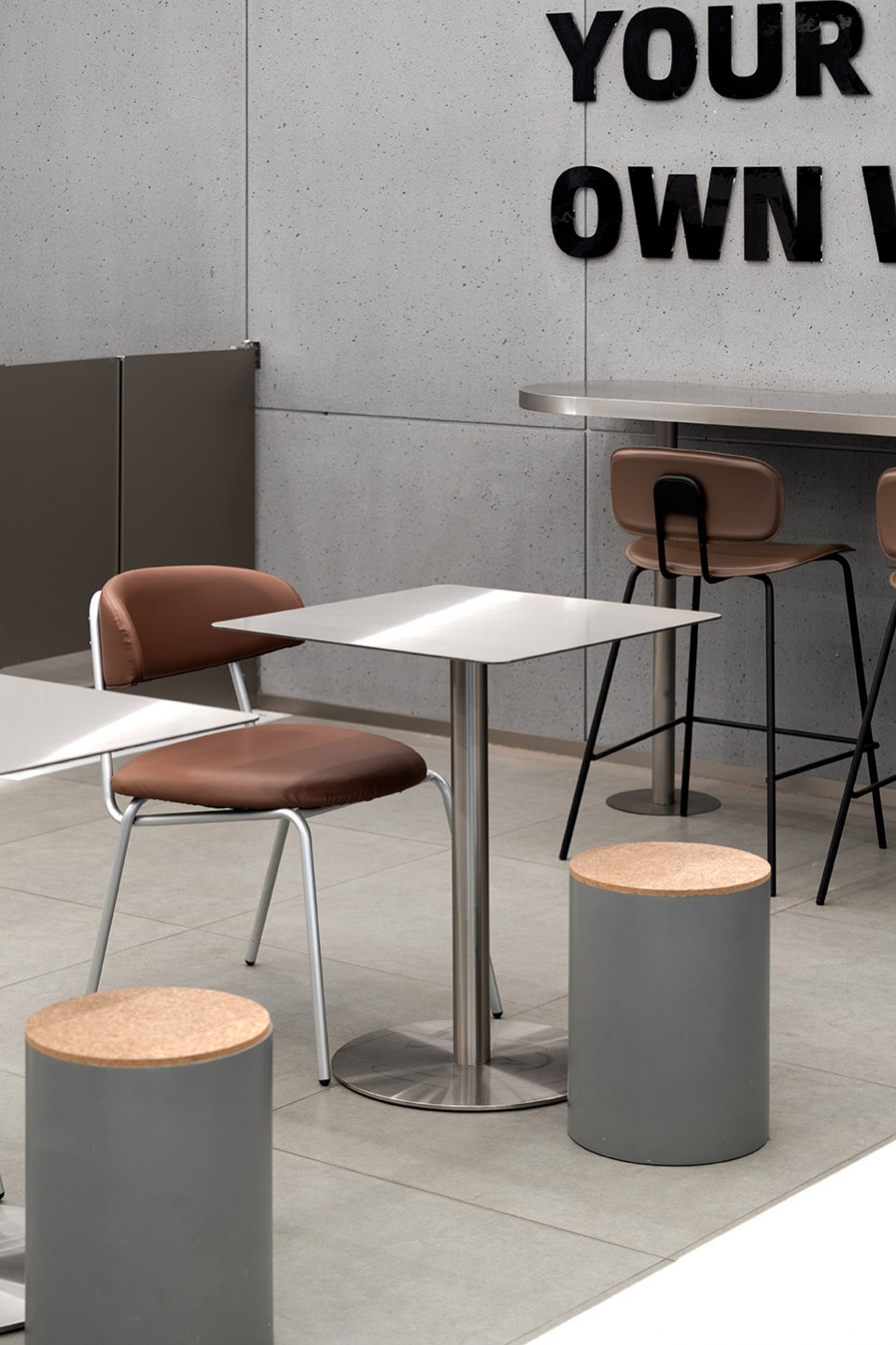 stainless steel and concrete intertwined ticle coffee series by daga architecture