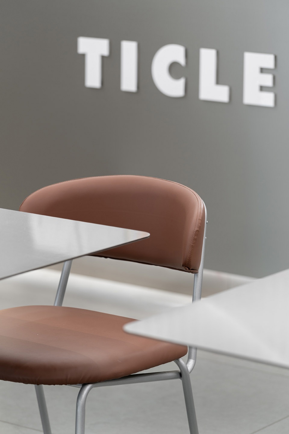 stainless steel and concrete intertwined ticle coffee series by daga architecture