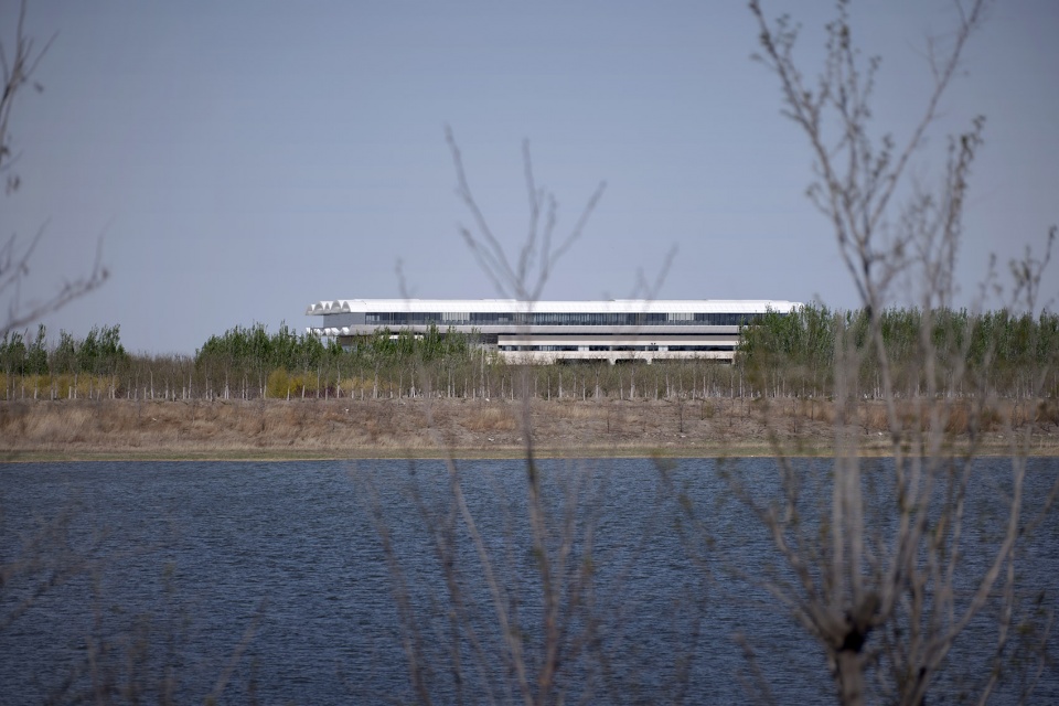 The new library and the school gate of CAUC by Original Design Studio TJAD