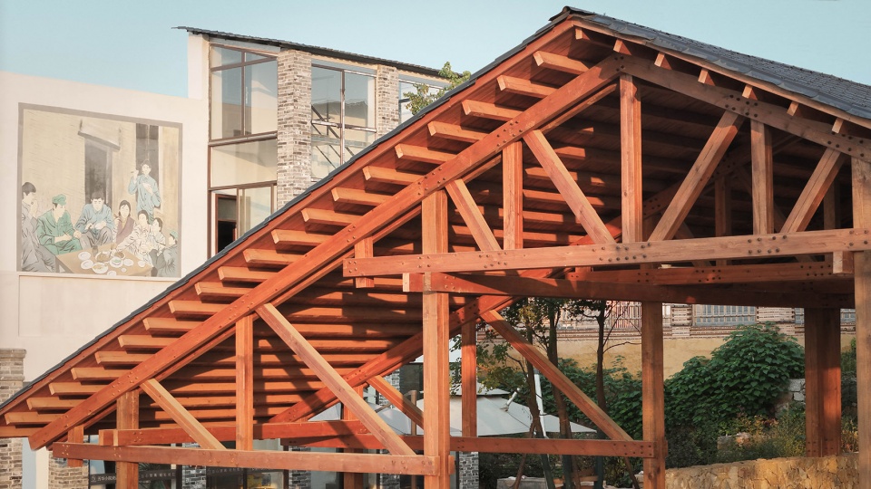 continuous roof wooden structure in dongyang by galaxy arch