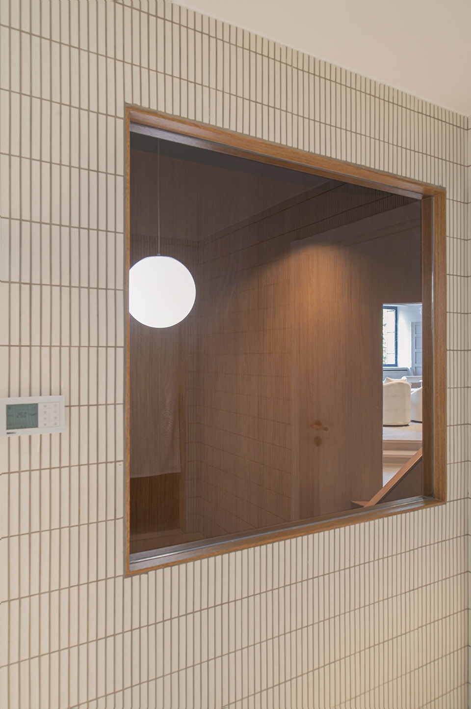 cutting the wall and borrowing the view by studio dotcof
