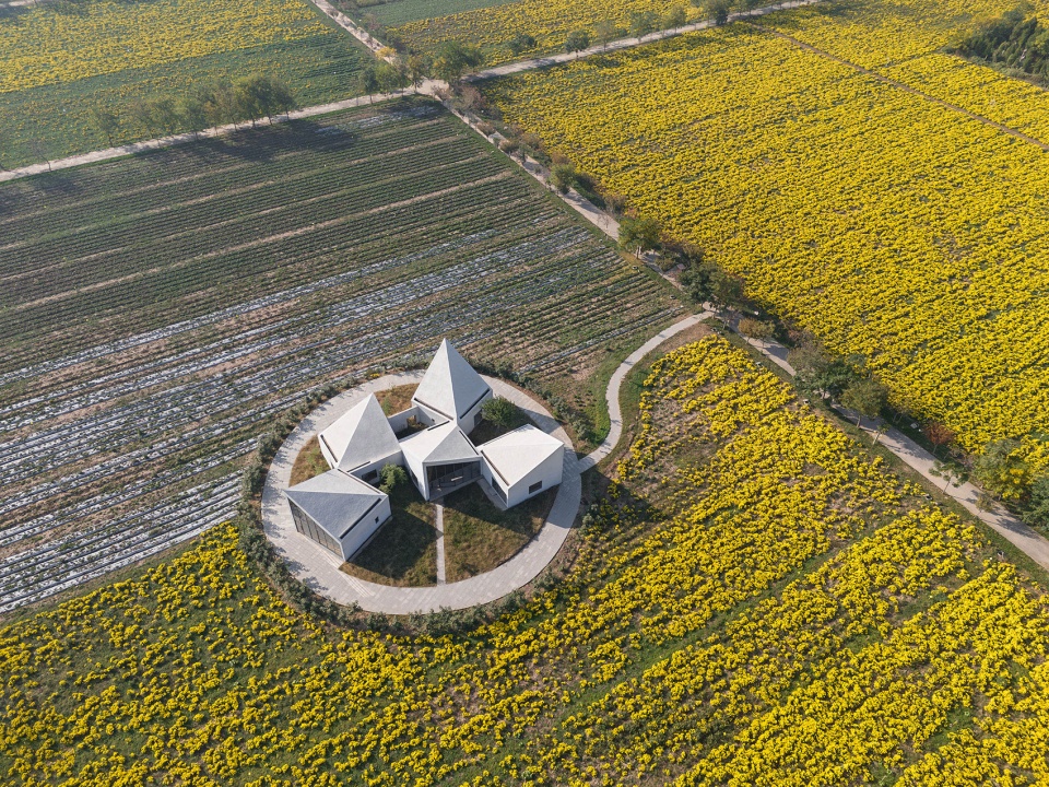 The Library In Ice Chrysanthemum Field China by ATELIER XI