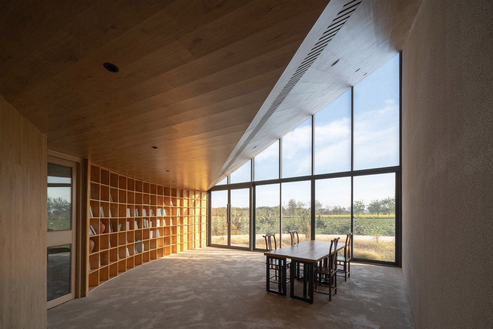 The Library In Ice Chrysanthemum Field China by ATELIER XI