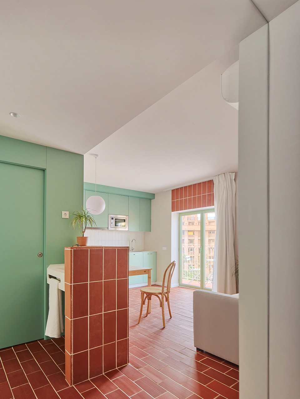 Transformation of an abandoned building into 27 apartments by NUA arquitectures