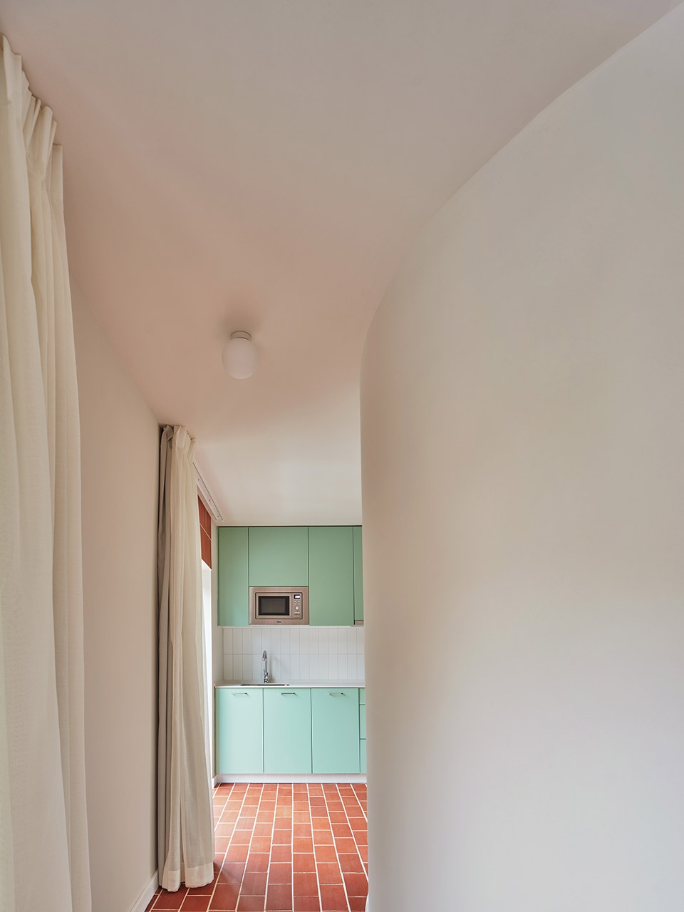 Transformation of an abandoned building into 27 apartments by NUA arquitectures
