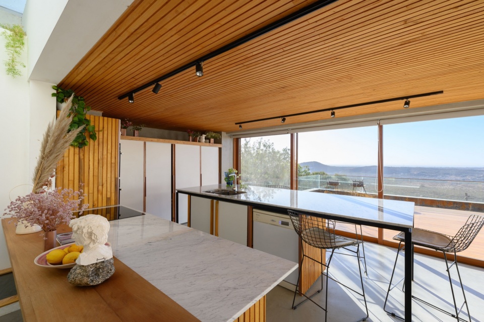 house in the stone by arq christian schlatter