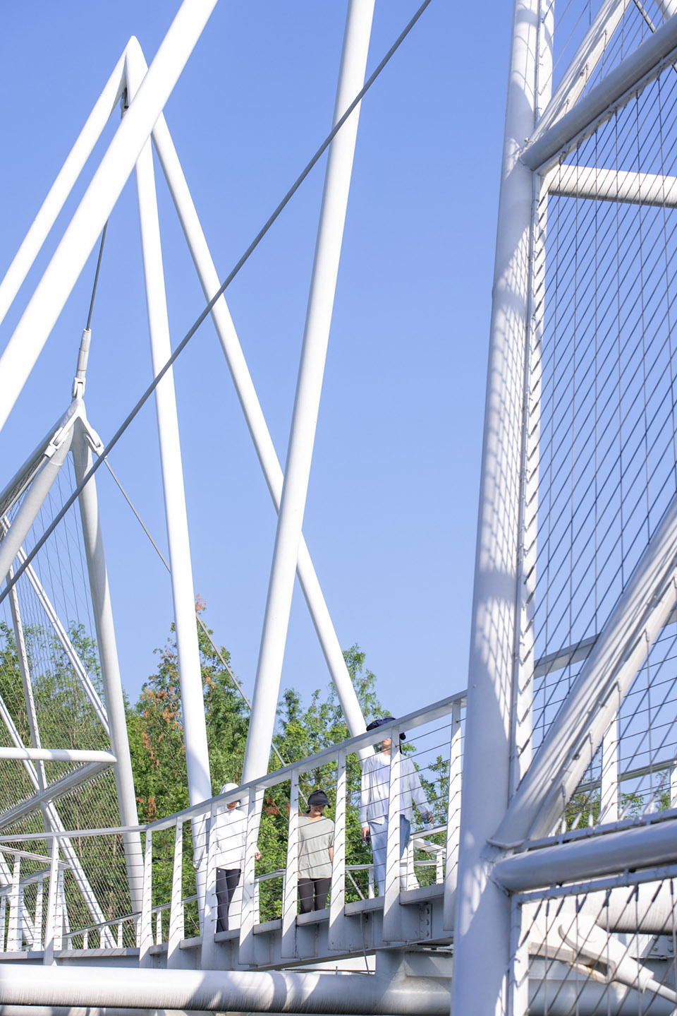 unarchitecte edenland pedestrian bridge in luxelakes by unarchitecte