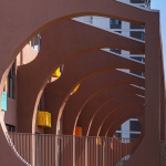 The kindergarten next to the old warehouses by URBANUS