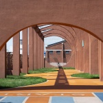 The kindergarten next to the old warehouses by URBANUS
