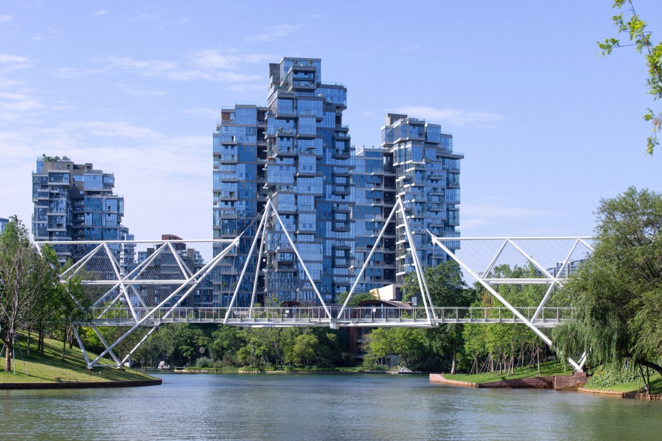 unarchitecte edenland pedestrian bridge in luxelakes by unarchitecte