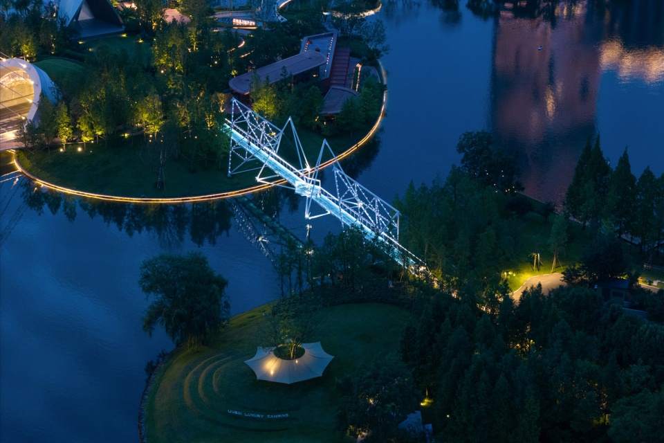 unarchitecte edenland pedestrian bridge in luxelakes by unarchitecte