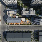 The kindergarten next to the old warehouses by URBANUS
