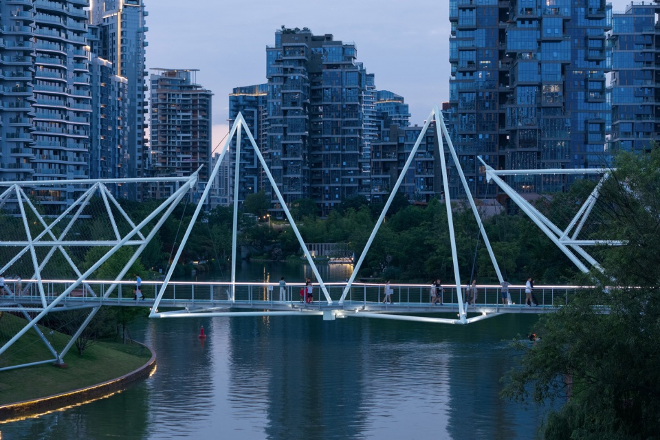 unarchitecte edenland pedestrian bridge in luxelakes by unarchitecte