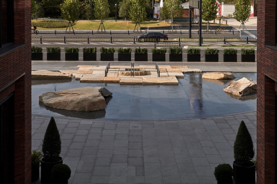 yiwu place bajiaojing historic well square by july design group