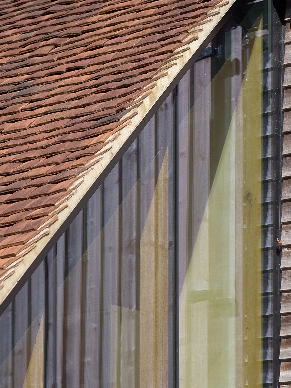 reworks 15th century barn by ashton porter architects