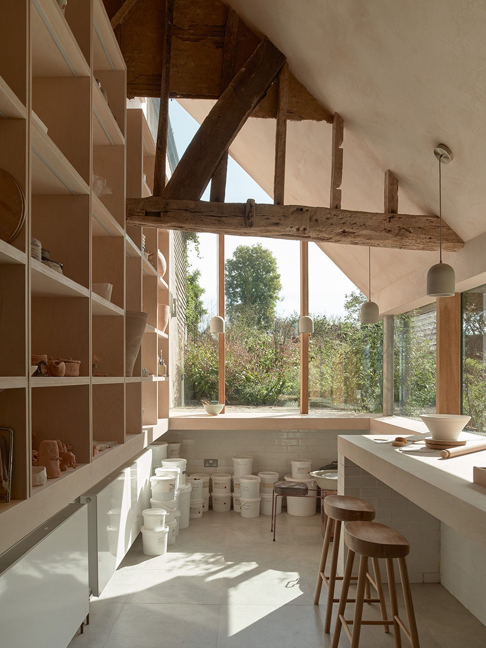 reworks 15th century barn by ashton porter architects