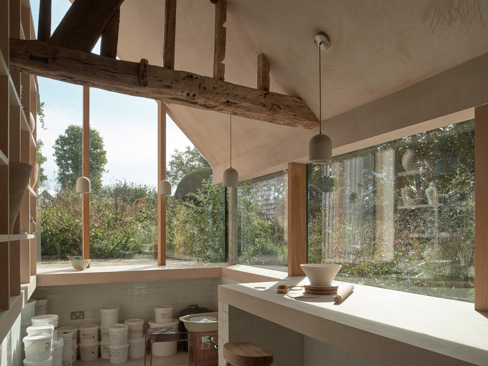 reworks 15th century barn by ashton porter architects
