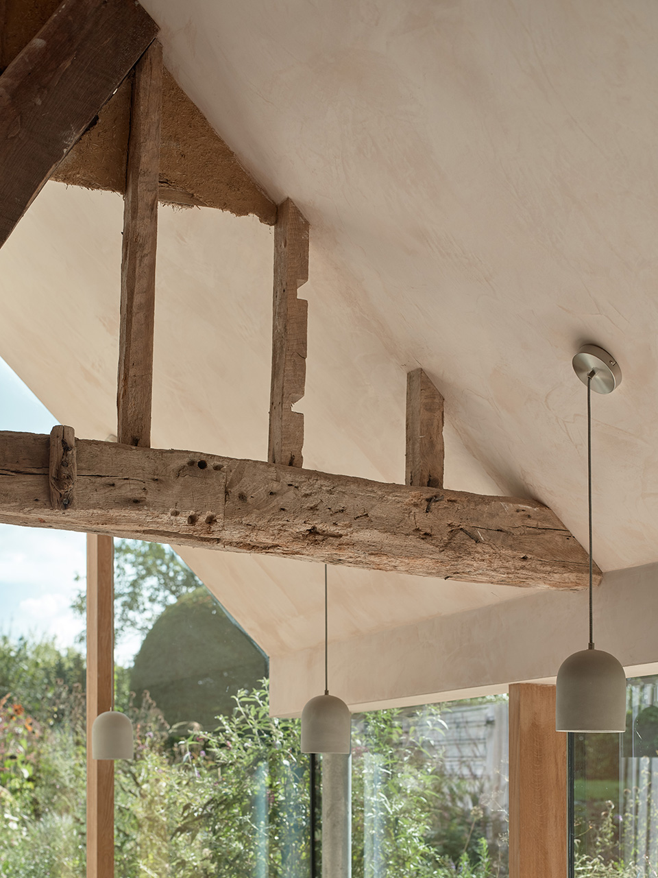reworks 15th century barn by ashton porter architects