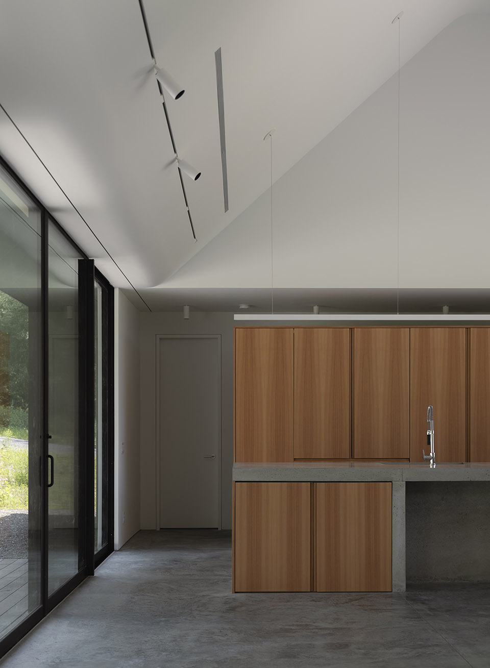 house in a meadow by group projects architecture