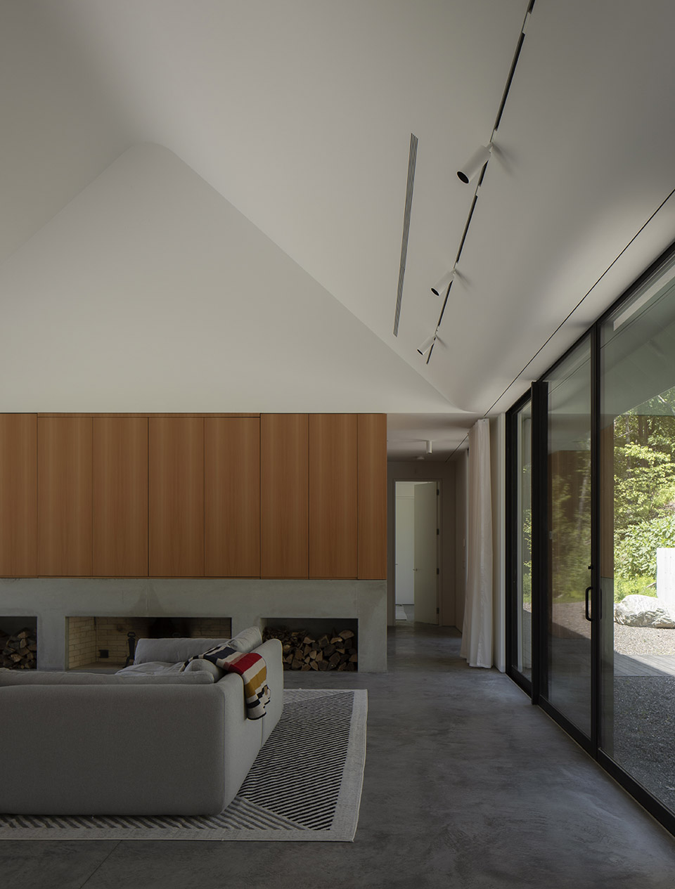 house in a meadow by group projects architecture