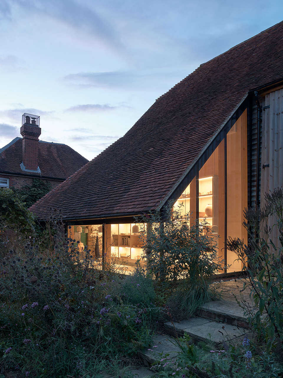 reworks 15th century barn by ashton porter architects