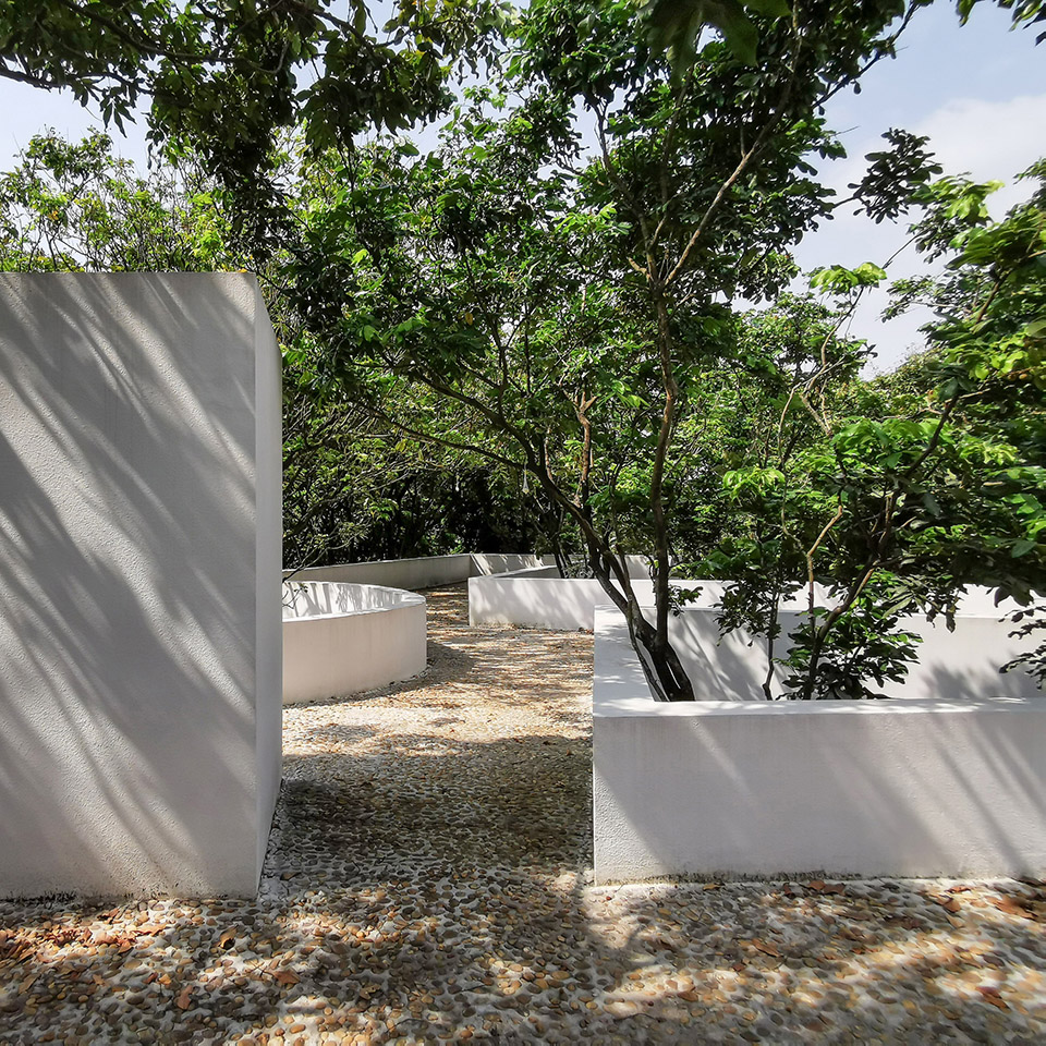 courtyard under longan trees by spacework architects