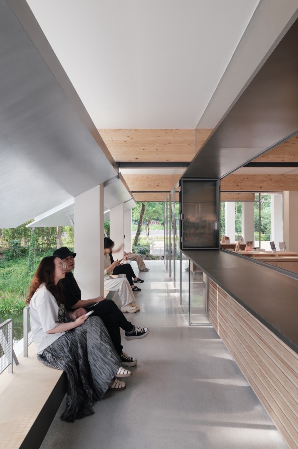 Xixi Goldmye Bookstore by Atelier Wen Arch