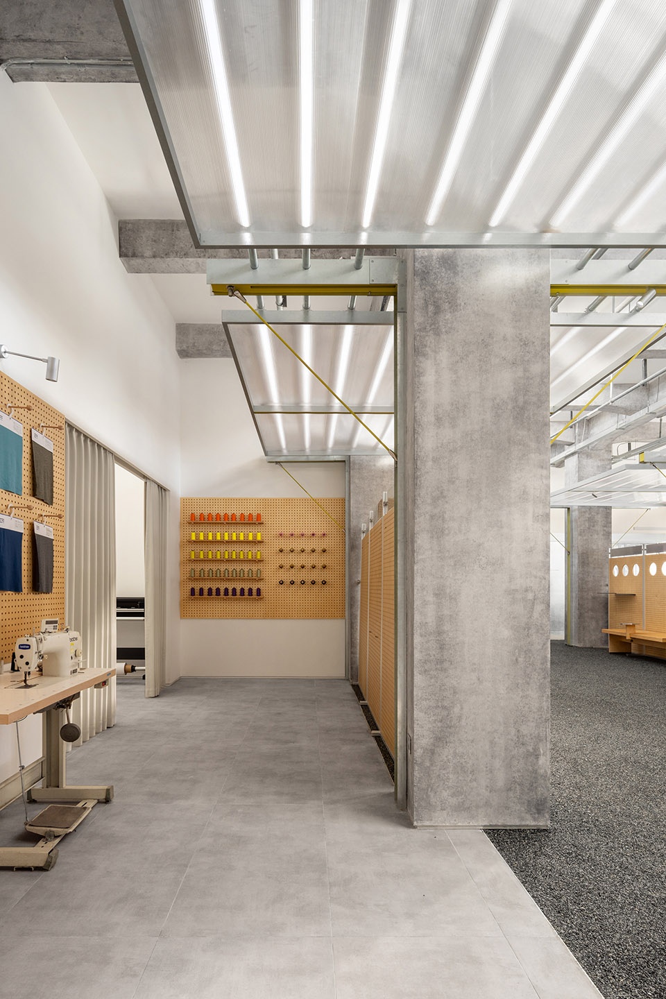 swiss outdoor apparel brand showroon hq by aam architects