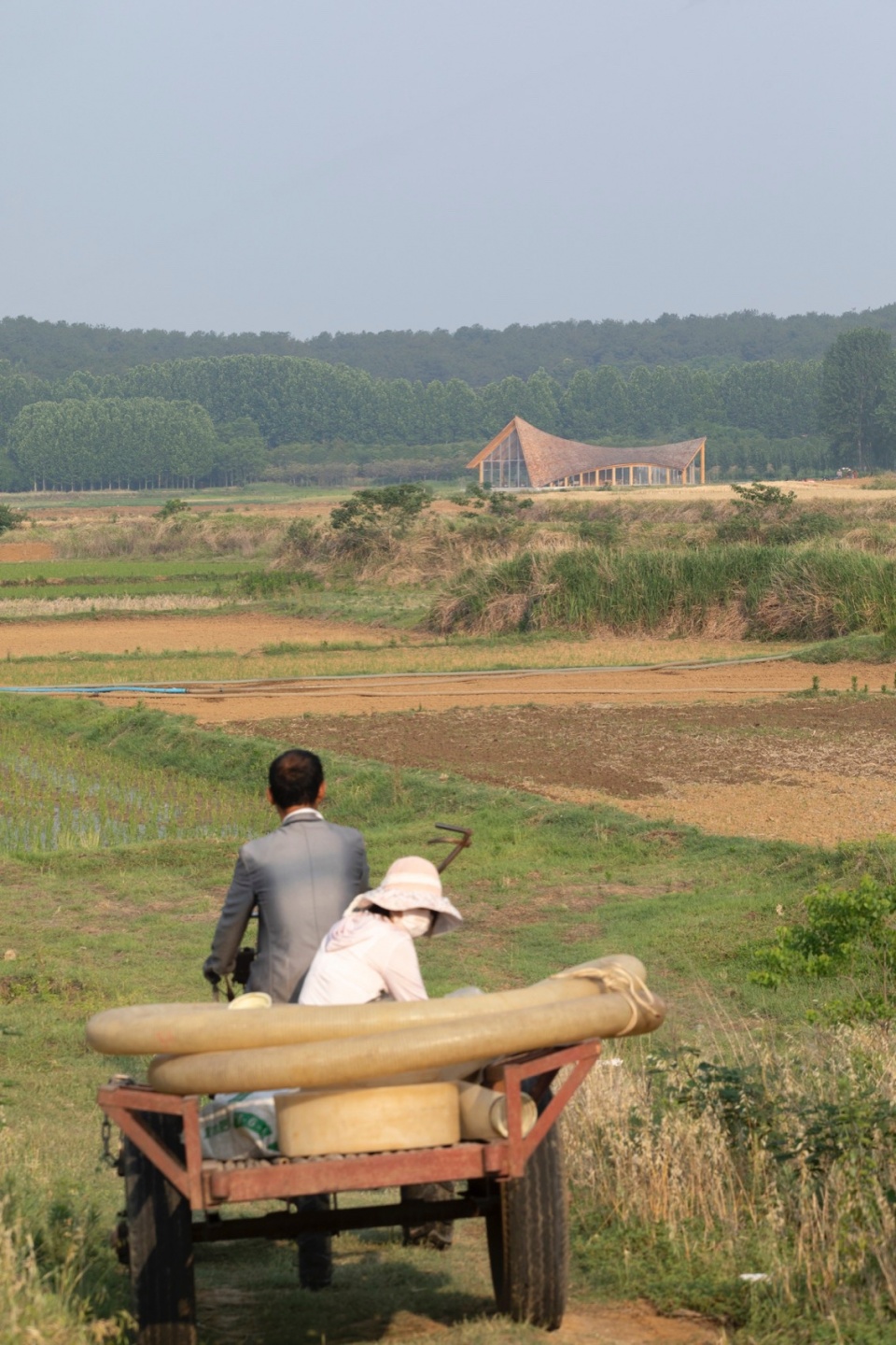 The Driftwood Village Center Xinyang by Primary Architects