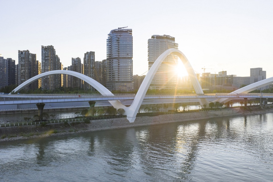 grand canal gateway bridge completed by zaha hadid architects
