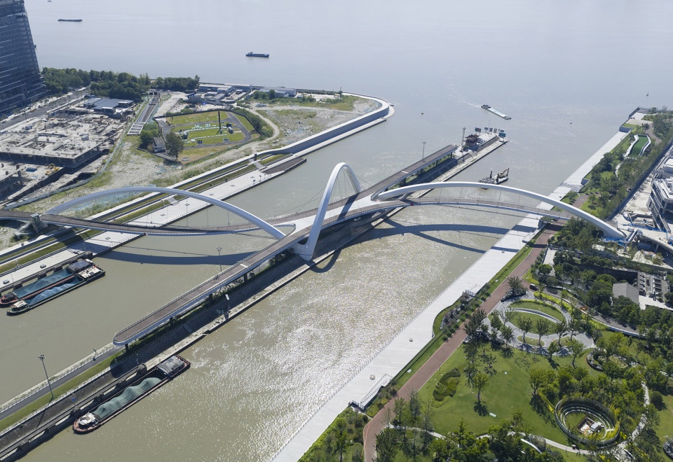 grand canal gateway bridge completed by zaha hadid architects