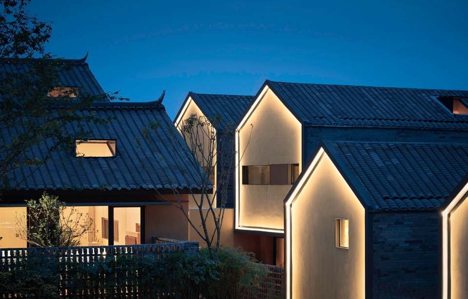 Pretty lodges built in mountains layering courtyard China by CC ARCHITECTURE