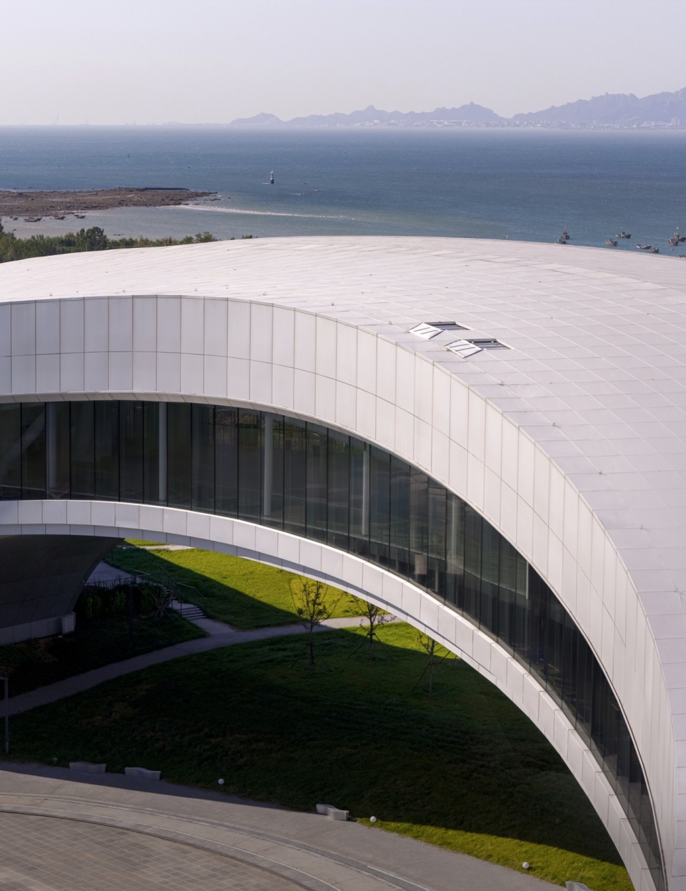 qingdao tangdao bay art center by oi architects