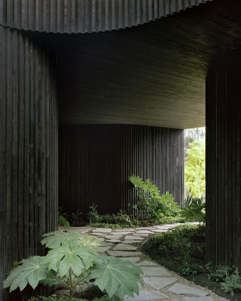house in a garden by edition office
