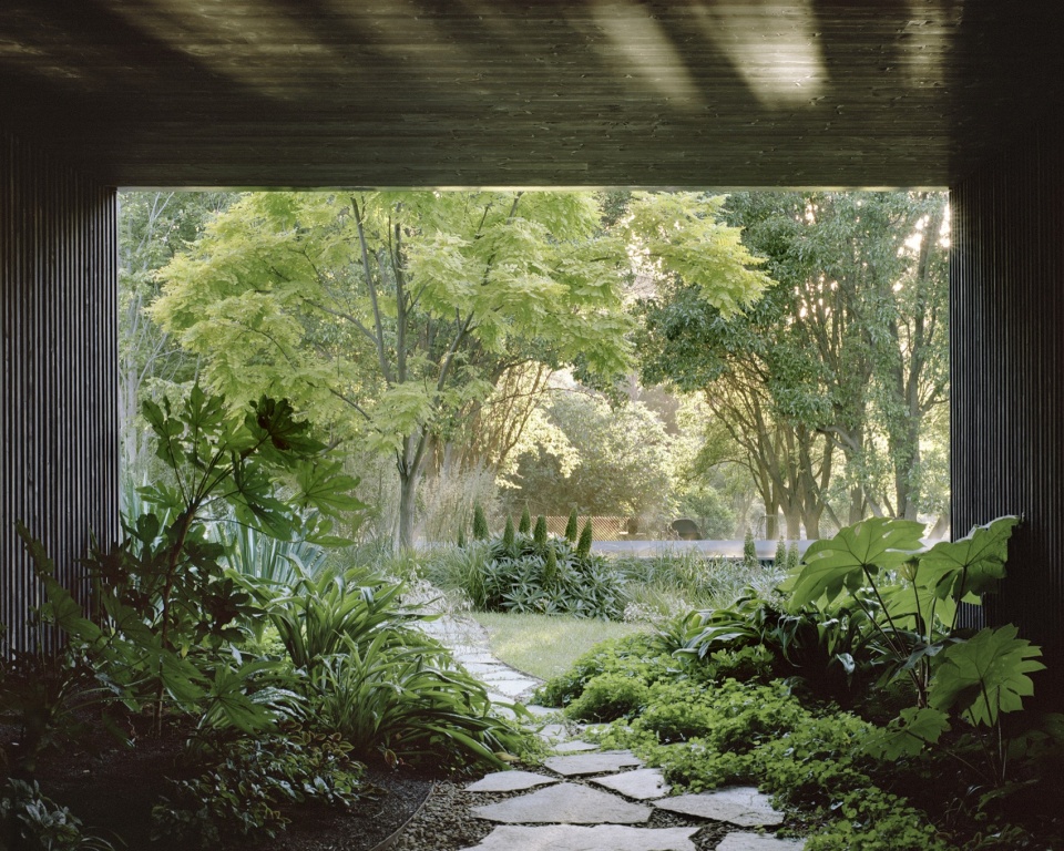 house in a garden by edition office