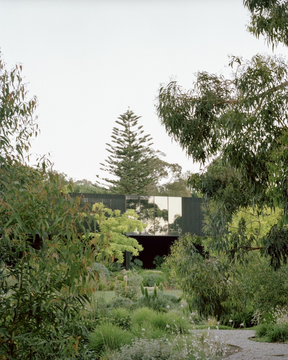 house in a garden by edition office