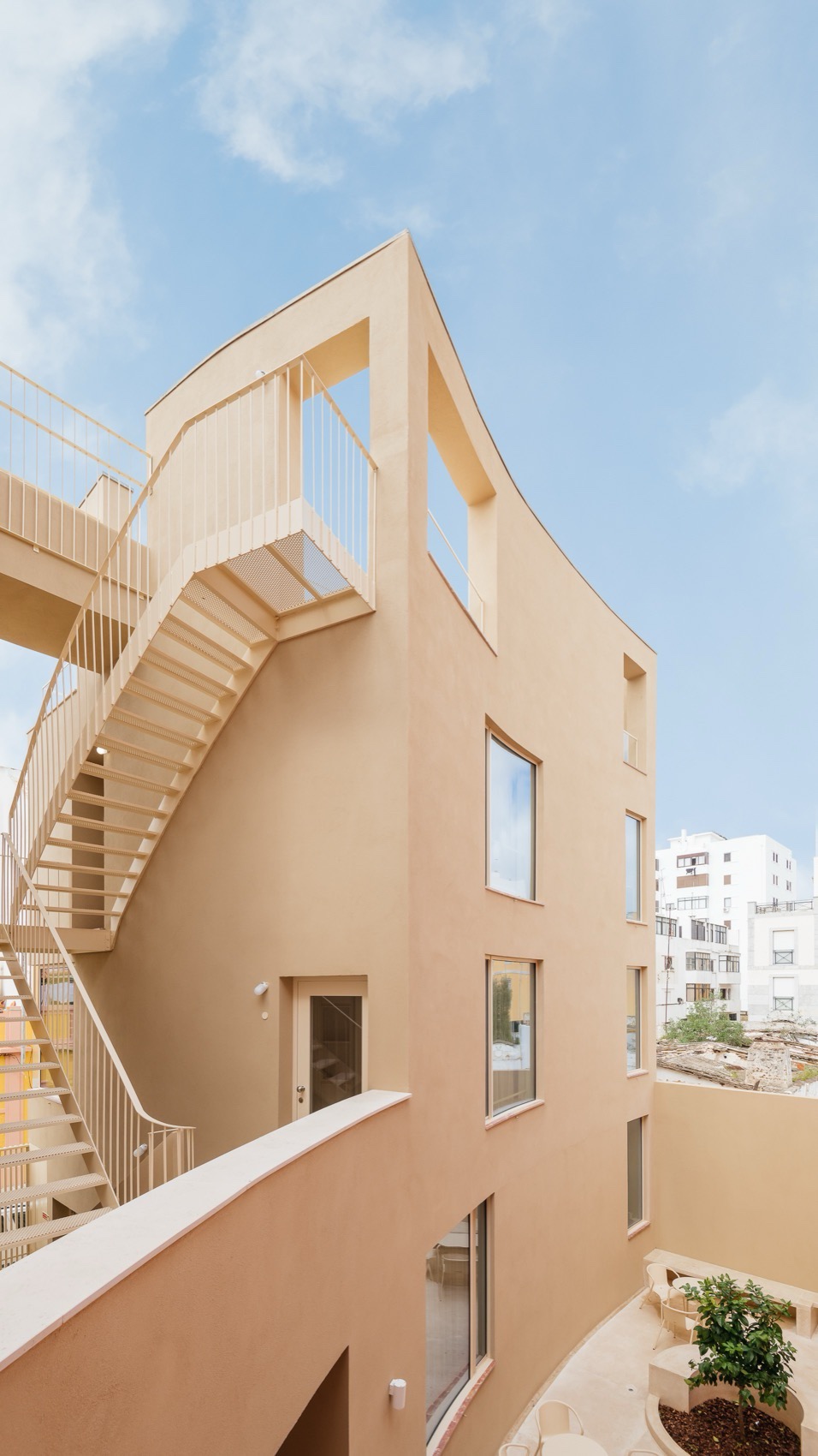 Mustard building by Aurora Architects Furo